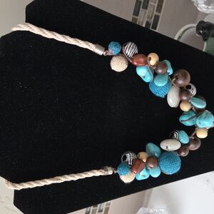 Handcrafted Beaded Necklace with Turquoise and Silver Accents